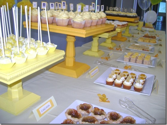 Yellow desserts on yellow cake plates