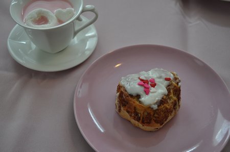 heart shaped cinnamon rolls and pink hot chocolate
