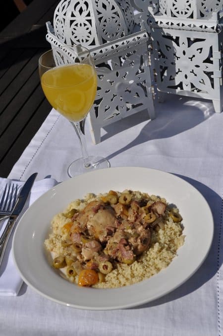 Easy Moroccan Chicken Tagine: easy to make without a tagine, loaded with green olives, apricots, and bacon.  Sure to become a favourite.