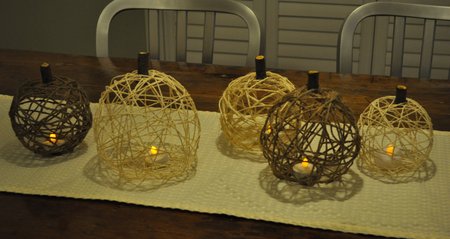 Twine Pumpkins: tutorial on how to ordinary kitchen string, twine, and balloons to craft these beautiful decorative pumpkins for fall.