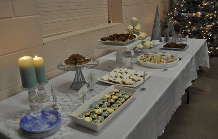 Women's Ministry Christmas Event: inexpensive DIY snowflake themed decorations, take out dinner ideas, and a snowflake dessert table.