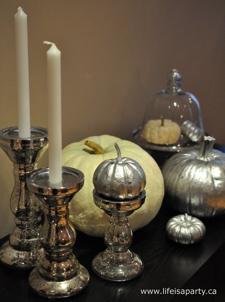 DIY Silver Mercury Glass Pumpkins: learn how to turn a real orange pumpkin into a silver, mercury glass looking one, with a little paint.