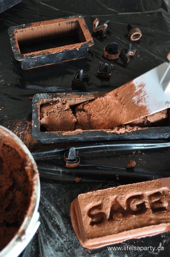 using cement moulds to create garden markers