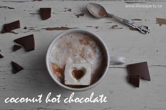 cup of coconut hot chocolate with a heart marshmallow