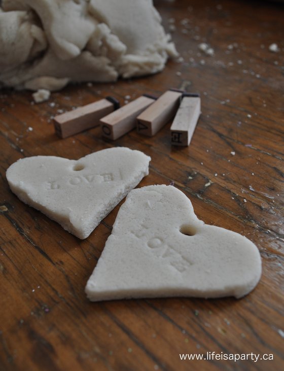 salt dough hearts rubber stamped with the word love