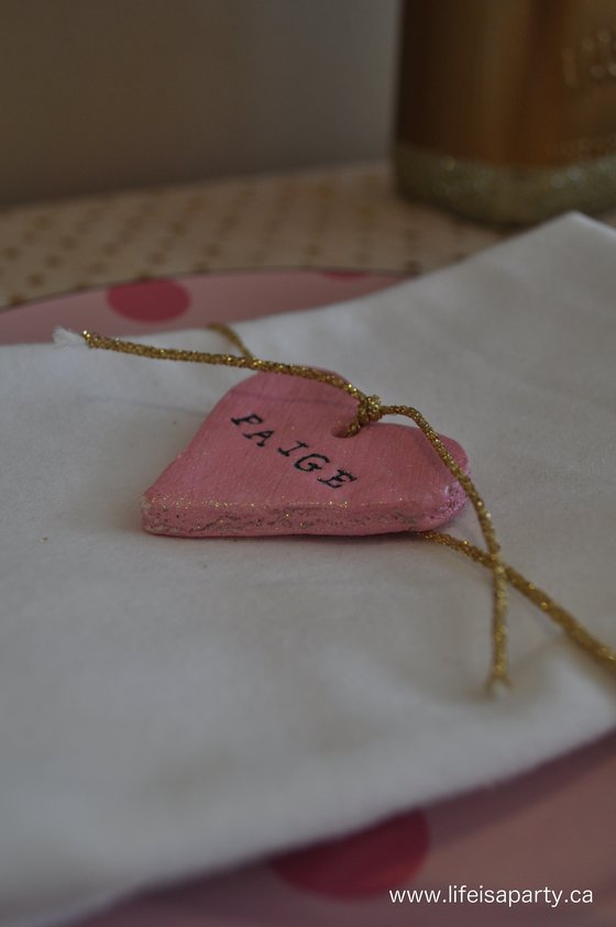 pink salt dough heart napkin ring stamped with a name