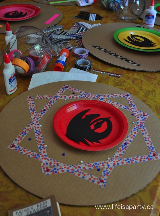 How To Train Your Dragon Birthday Party: Make your own shield, train your dragon stations, sensory table, and dragon training survival loot bags!