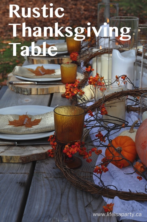 Rustic Thanksgiving Table: set with diy wood chargers, candles, bittersweet, pumpkins, vintage pieces, and a pinecone garland.
