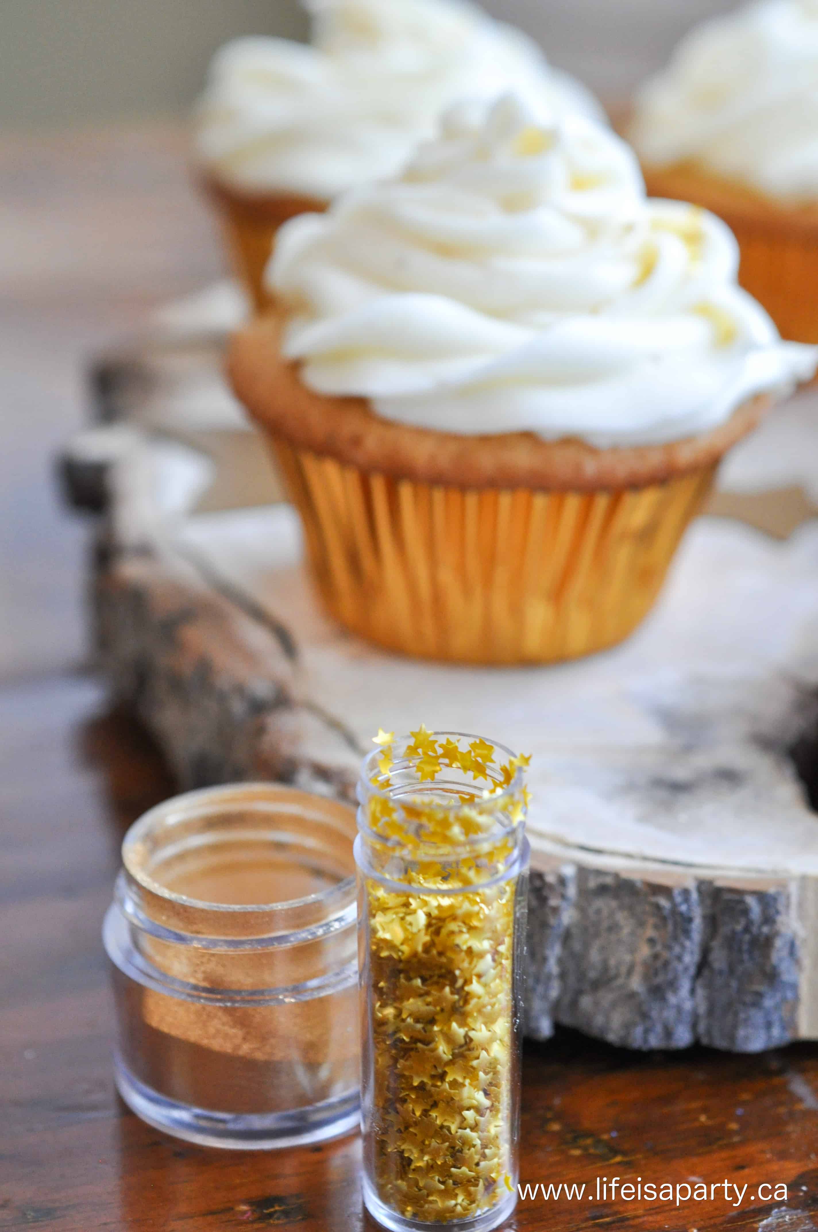 gold food glitter and gold star sprinkles on eggnog cupcakes with homemade eggnog frosting