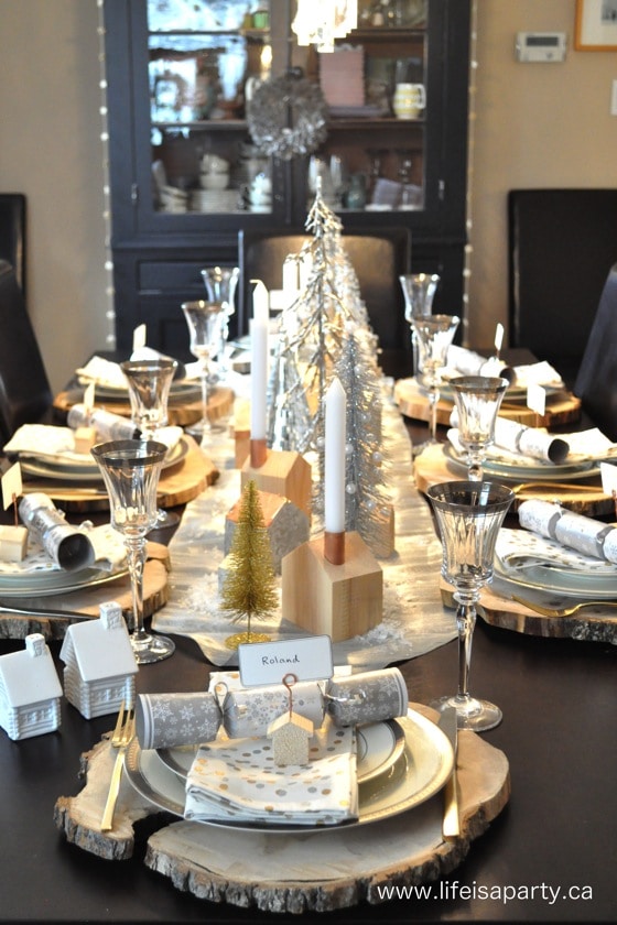 Winter Tablescape: beautiful Christmas or winter table with DIY mini house candle holders and place card holders.