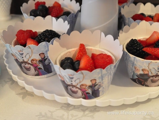 mixed berries in frozen themed paper cups