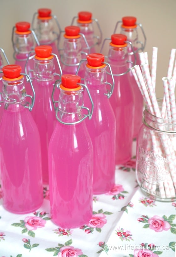 pink lemonade in a glass bottle