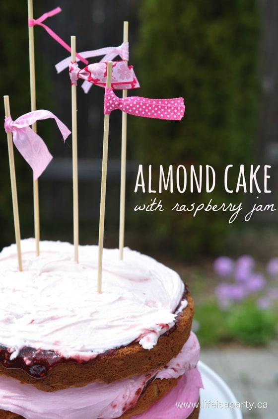 Almond Cake with Raspberry Jam -delicious home made almond cake recipe, with a sweet filling of pretty ombre pink icing and raspberry jam.