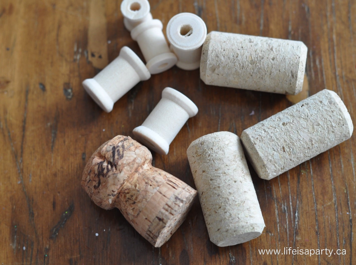 wood spools and wine corks