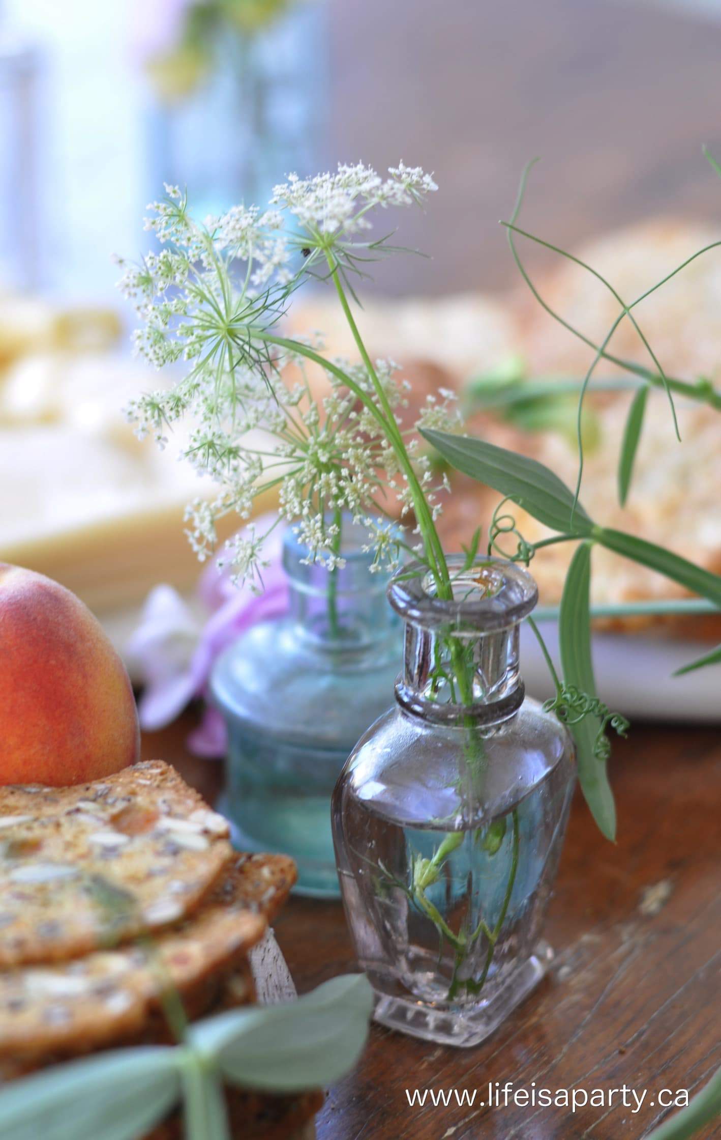 queen annes lace in a vintage glass bottles