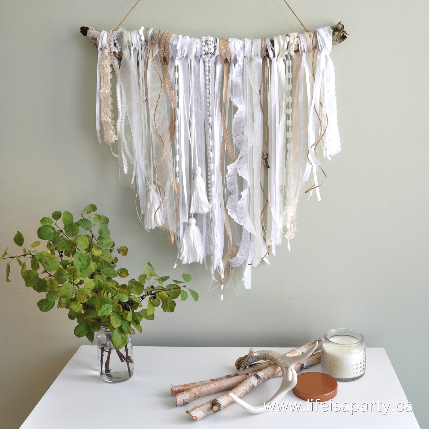 Wall Hanging with foliage and candle