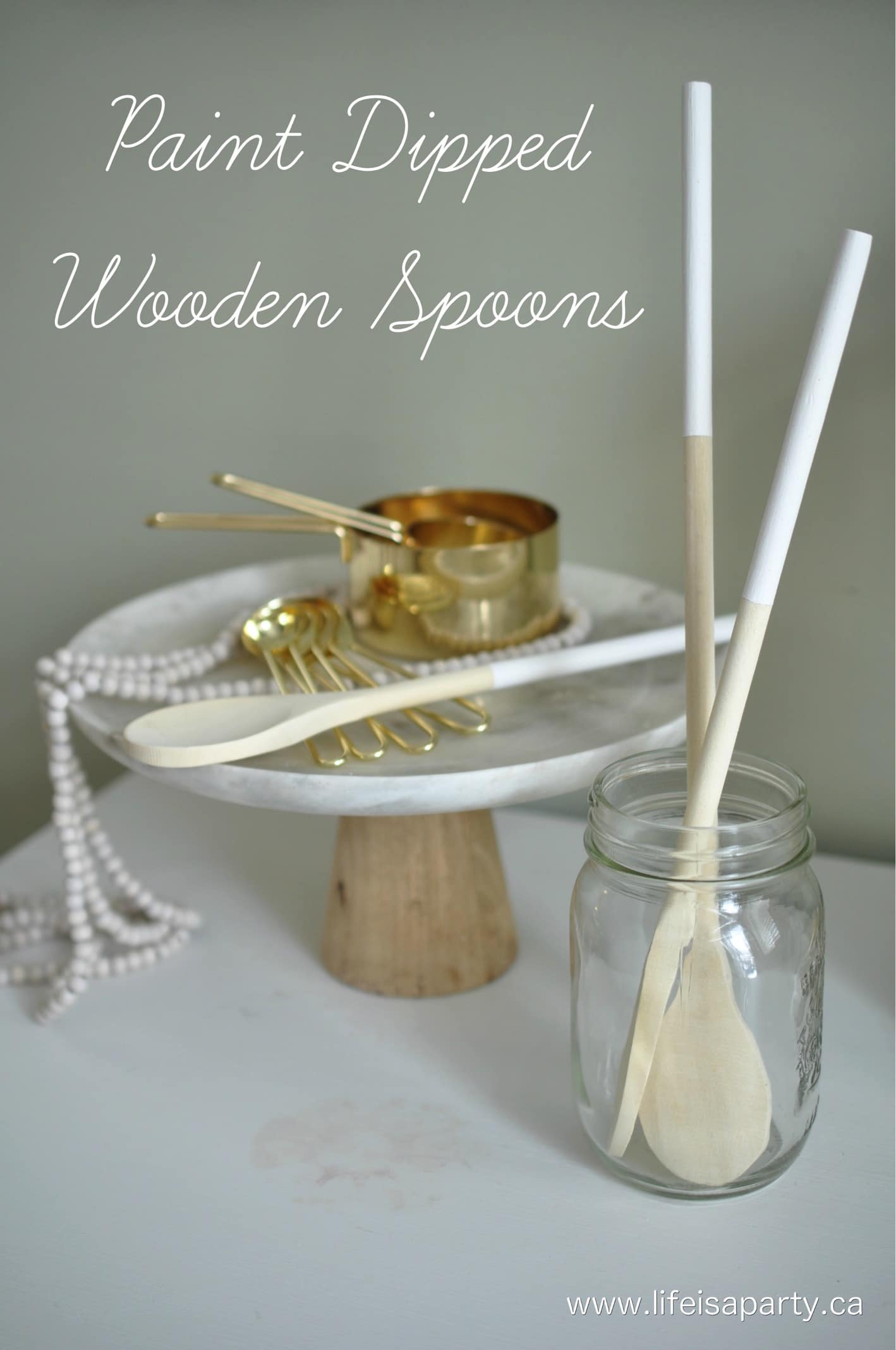 Paint Dipped Wooden Spoons: Easy DIY to take dollar store wooden spoons from boring to beautiful, the perfect stylish addition to any kitchen.