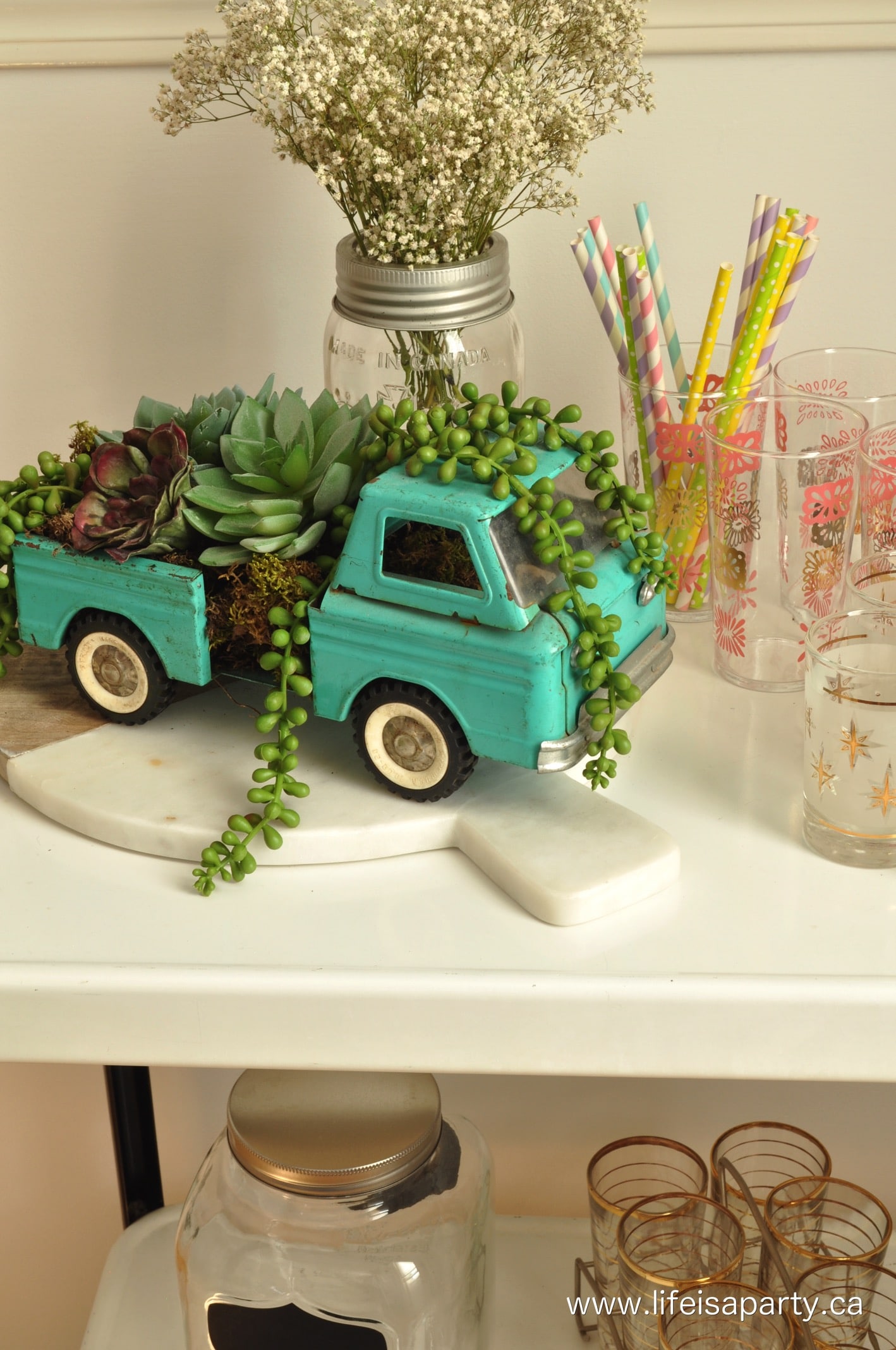 vintage toy truck with succulents
