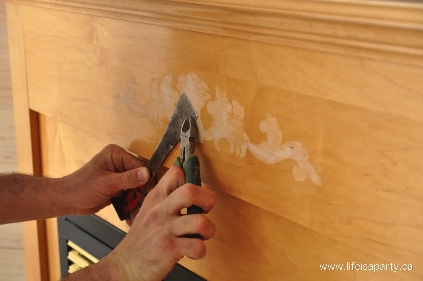 how to remove a wood decal from a fireplace