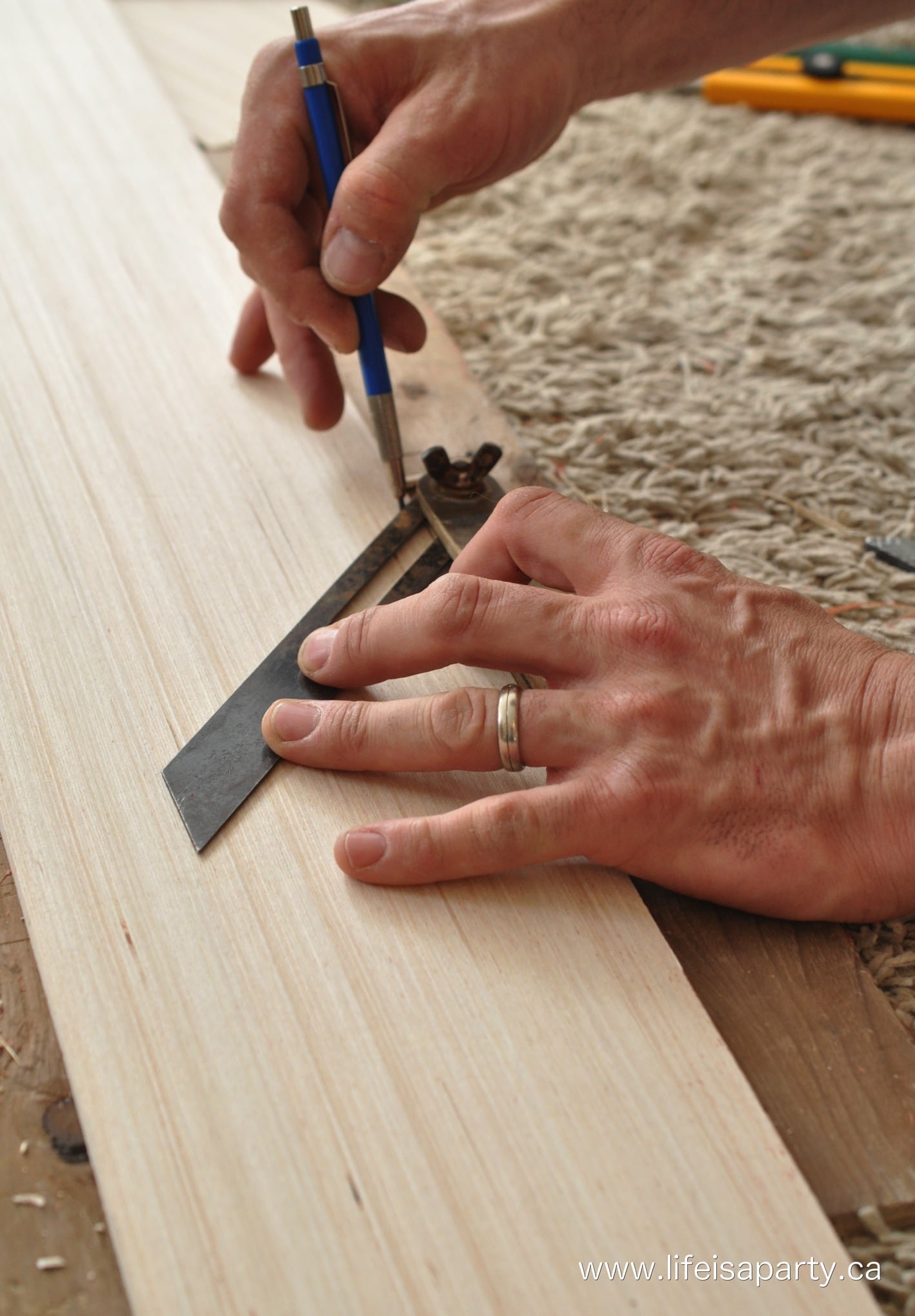 using a carpenters sliding bevel to cut angles when installing shiplap