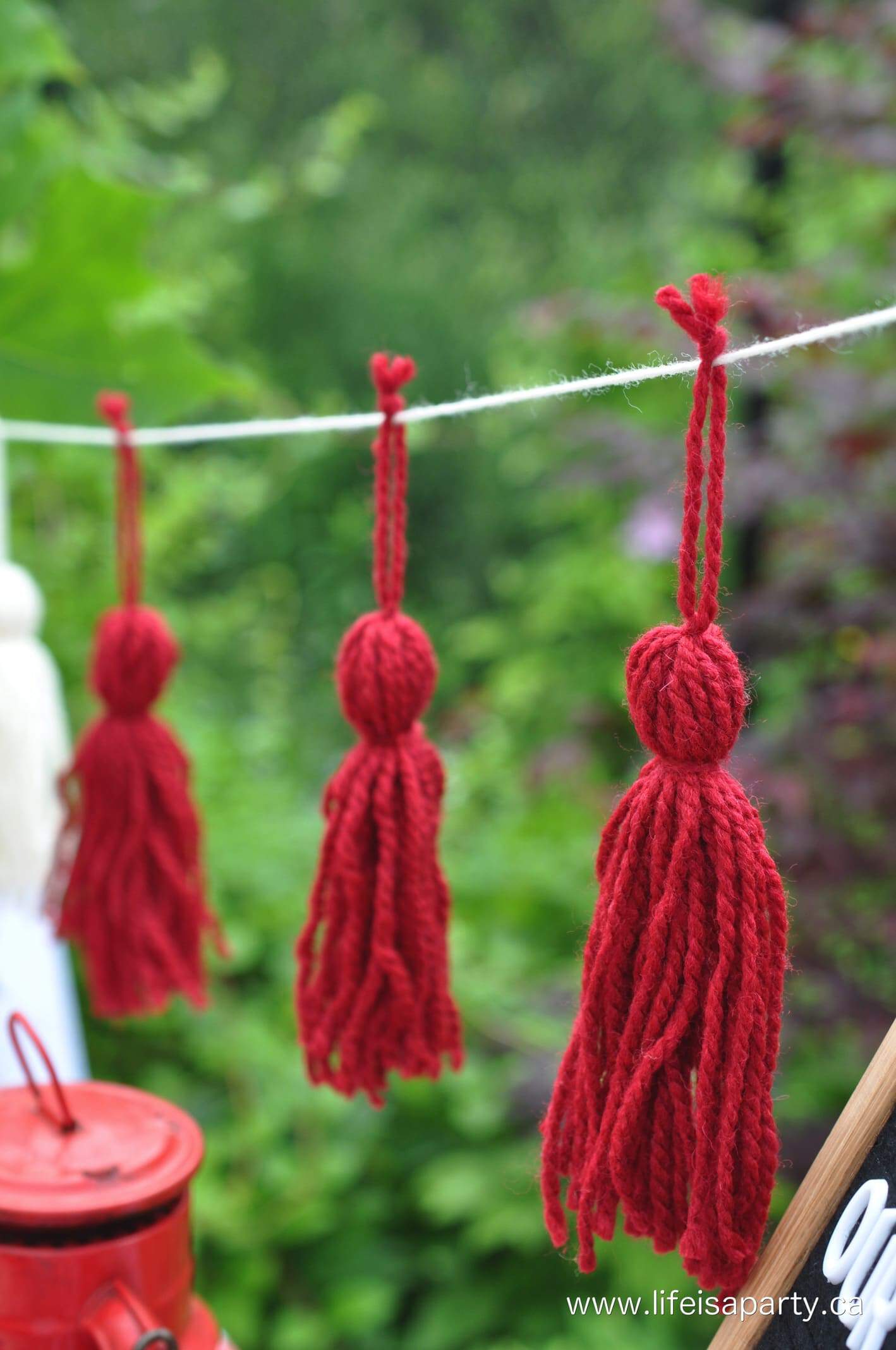 red DIY yarn tassels