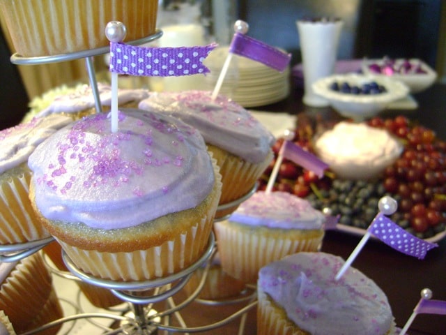 Purple Party Food: lots of purple sweets for a purple themed party including a purple fruit tray, lots of purple candy, and blueberry trifle.