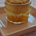 Individual peach cobbler in a mini mason jar.