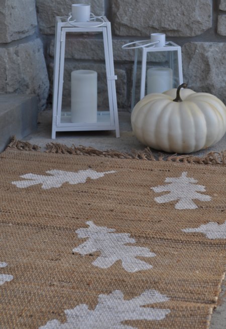 DIY Fall Doormat: turn a plain doormat into a fall doormat with this simple DIY using craft paint and a DIY stencil to add leaves.