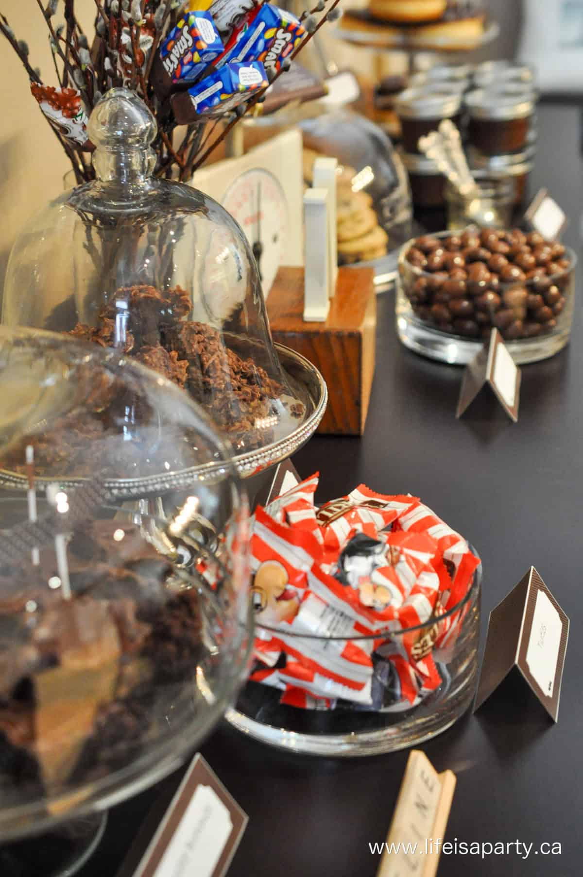 Chocolate treats on a chocolate themed desssert table.