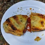 Campfire paninis on a plate.