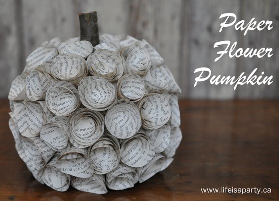 Paper Flower Pumpkin: Use a faux pumpkin and an old book to create this pretty paper flower pumpkin craft, the perfect additon to your fall decor.
