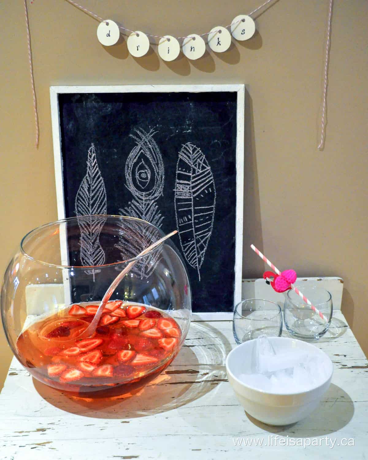 Pink punch flamingo party drink station.