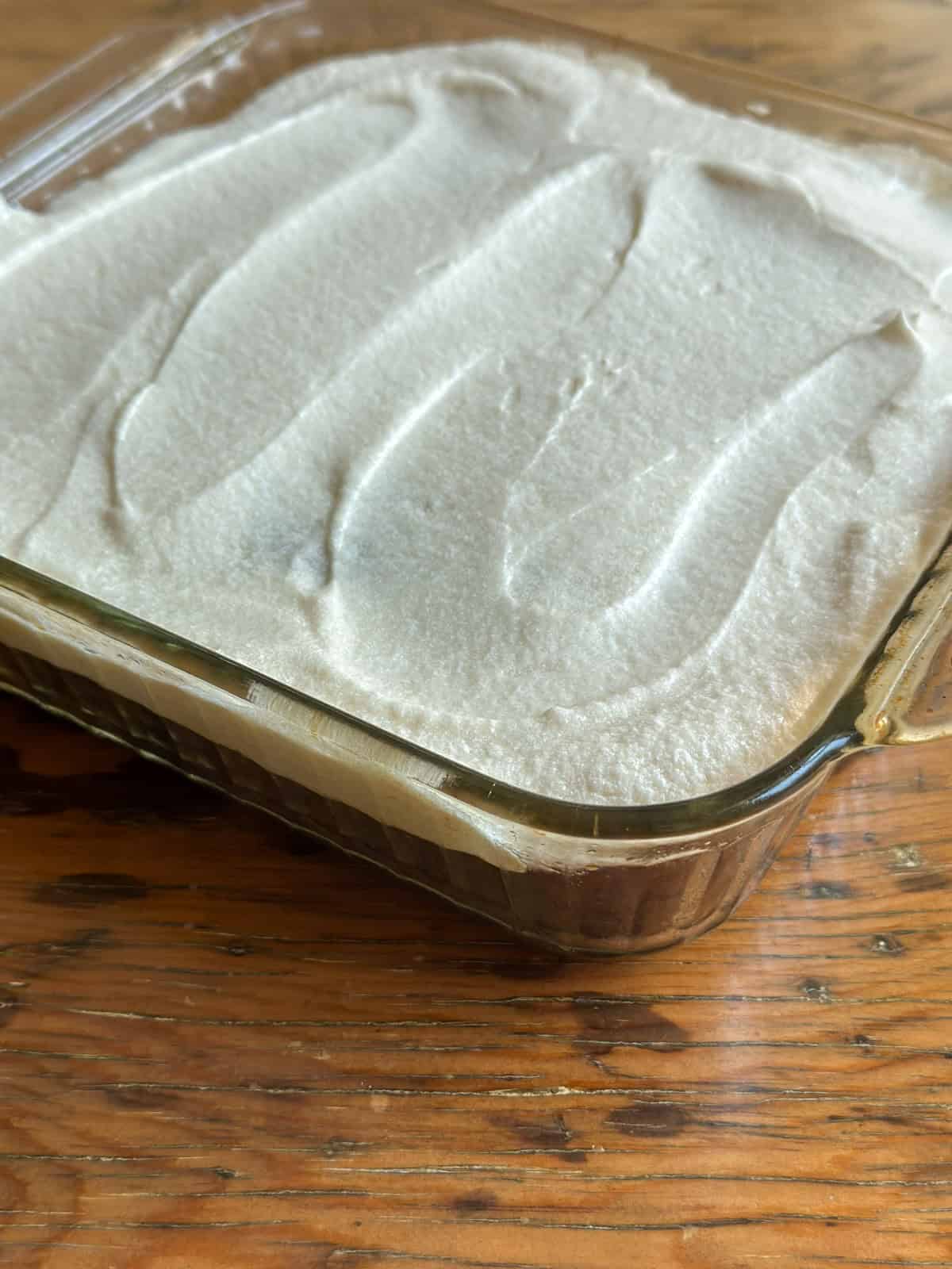 Banana snack cake with vanilla frosting.