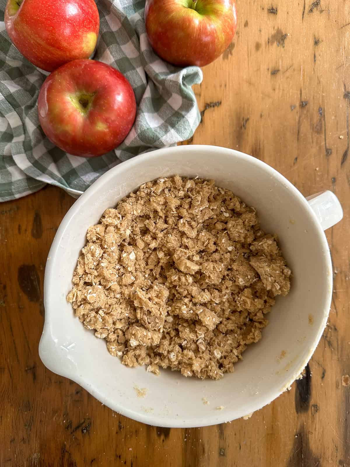 Apple crisp topping in a mixing bowl, before adding it to the apples.