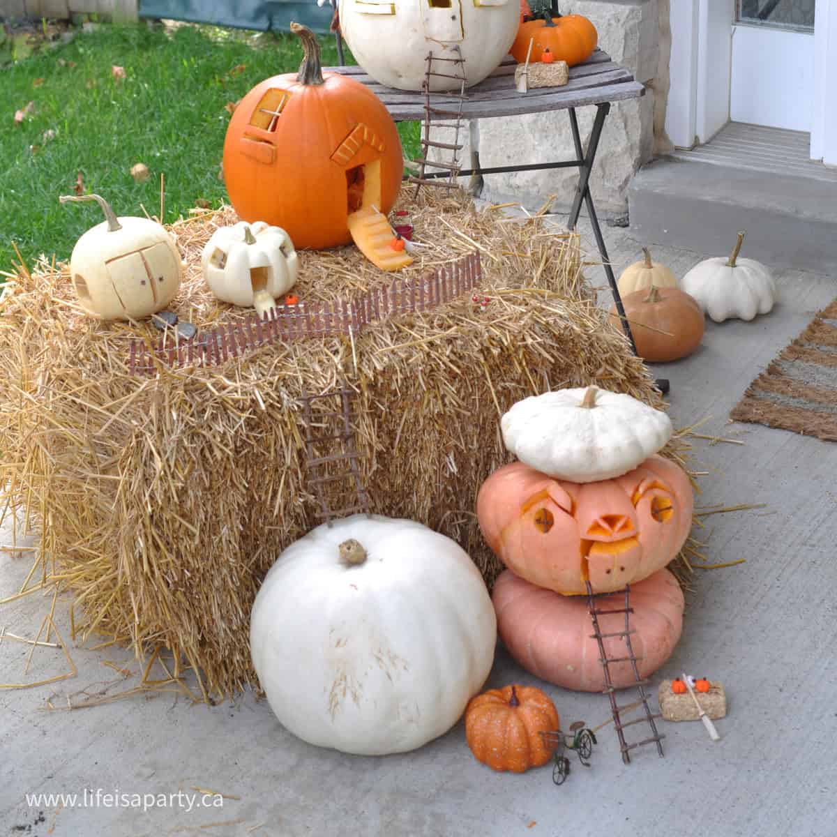 DIY carved pumpkin fairy village with fairy house Jack-o-lanterns.