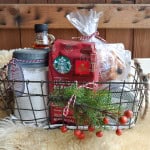 Breakfast basket filled with coffee beans, homemde pancake mix, pastries and more.