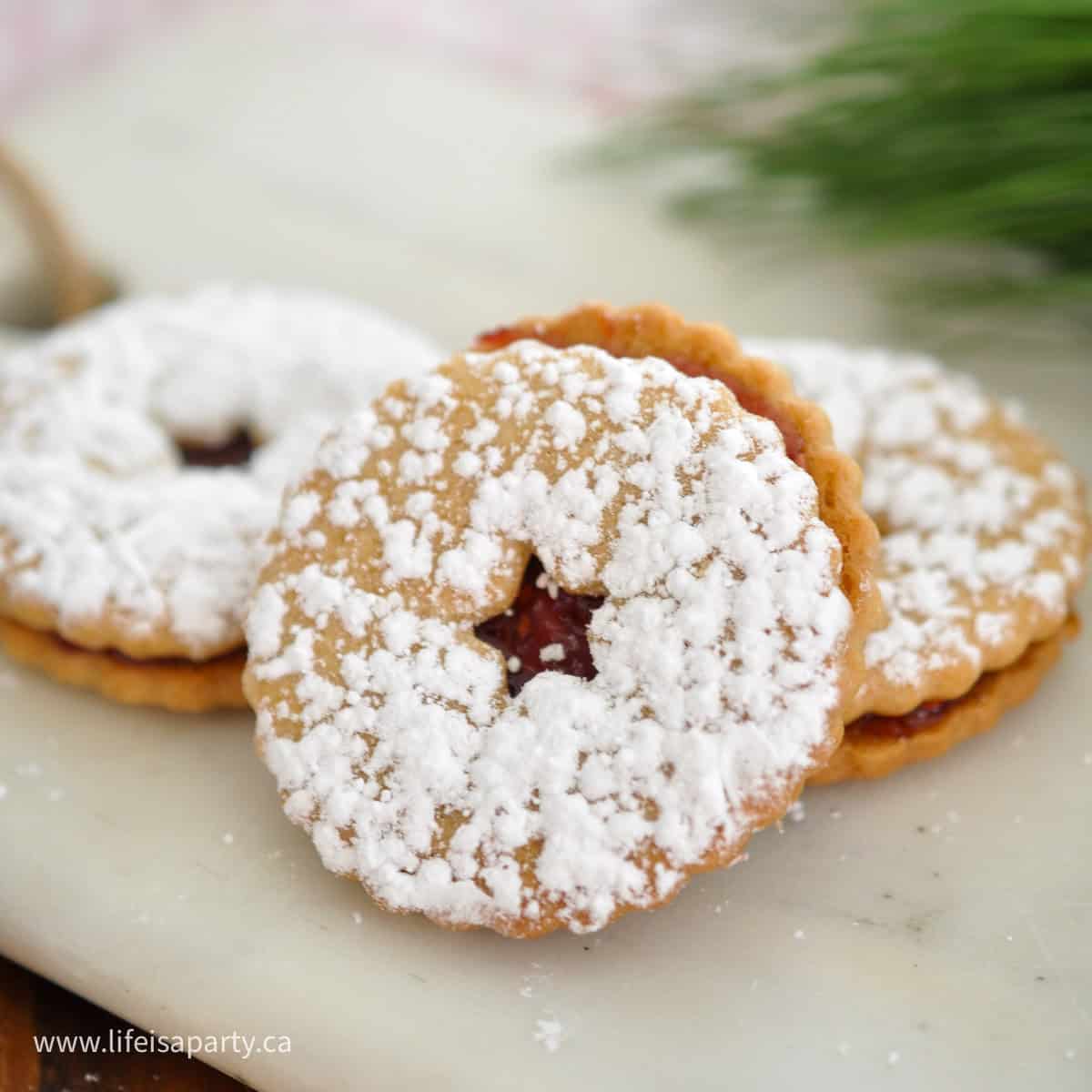 Jam Jam cookie recipe, with cookies laying on a marble serving tray.