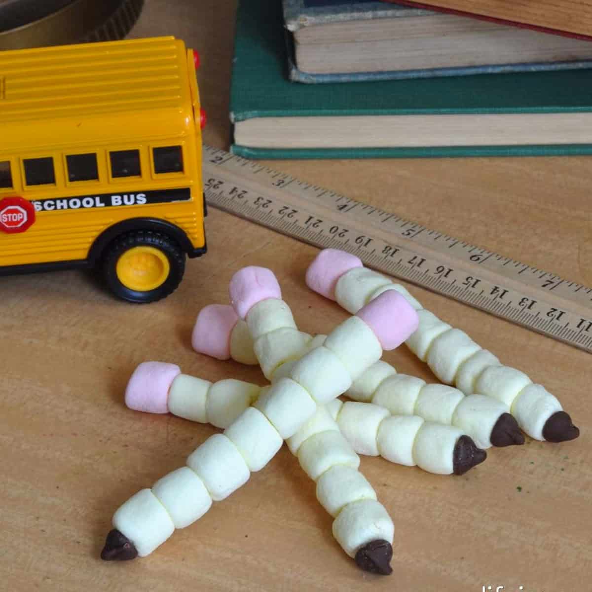 Back to school marshmallow pencil snacks made with marshmallows and chocolate chips.