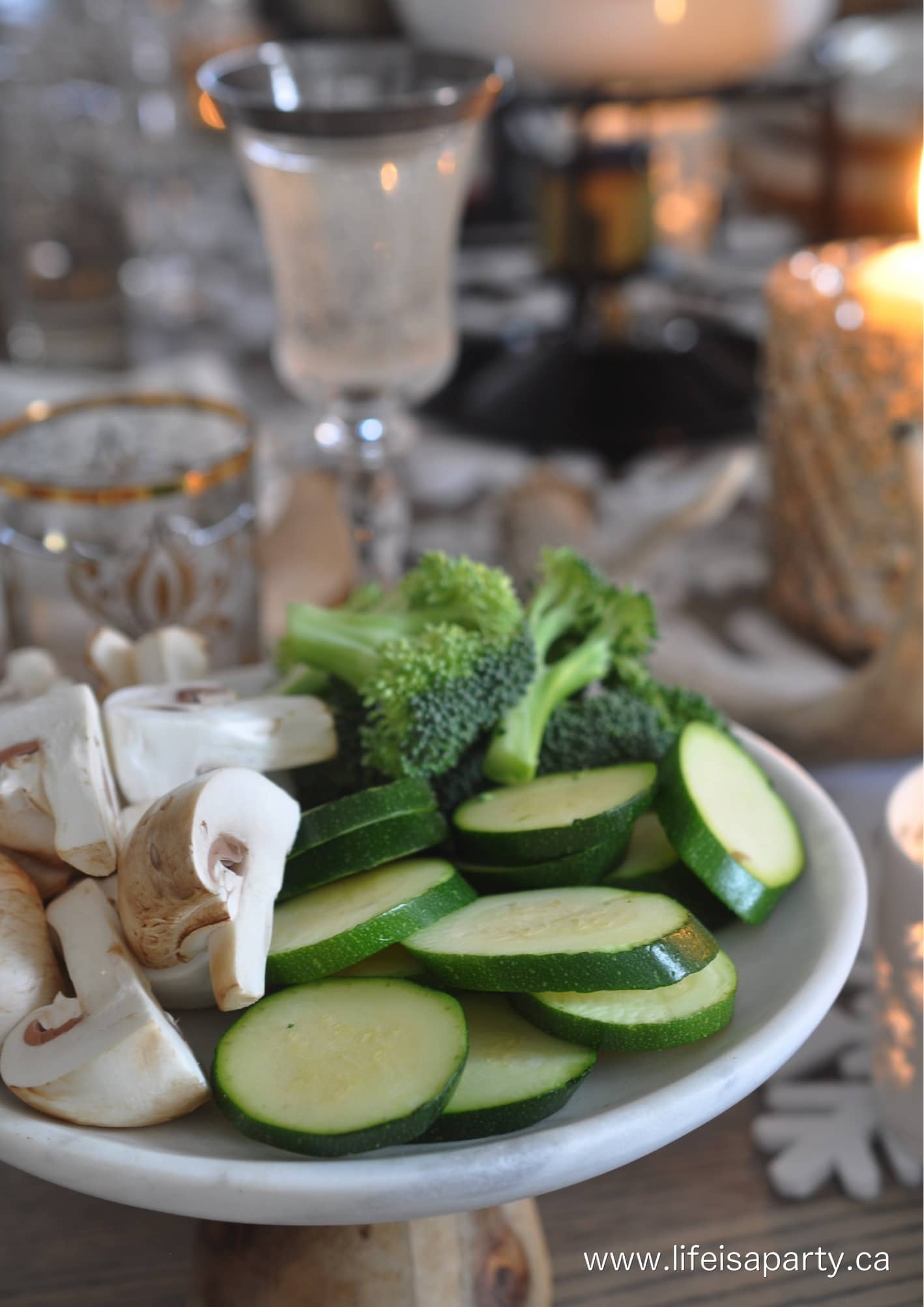 Raw mushrooms, zucchini, and broccoli ready to dip and cook as a tempura fondue.