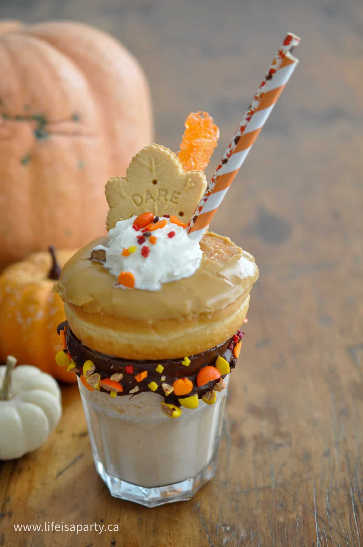 Pumpkin spice milkshake and toppings.