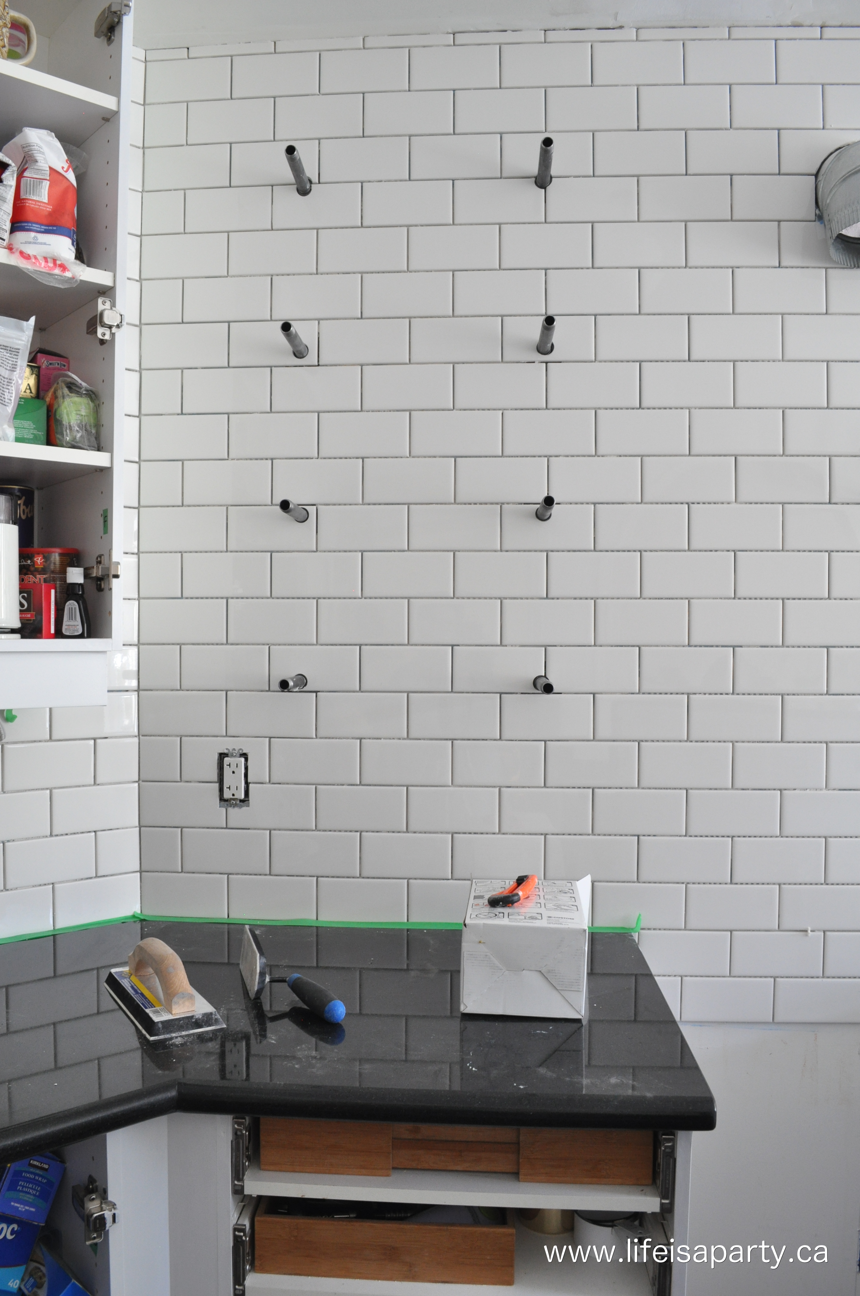 white subway tile with dark grout