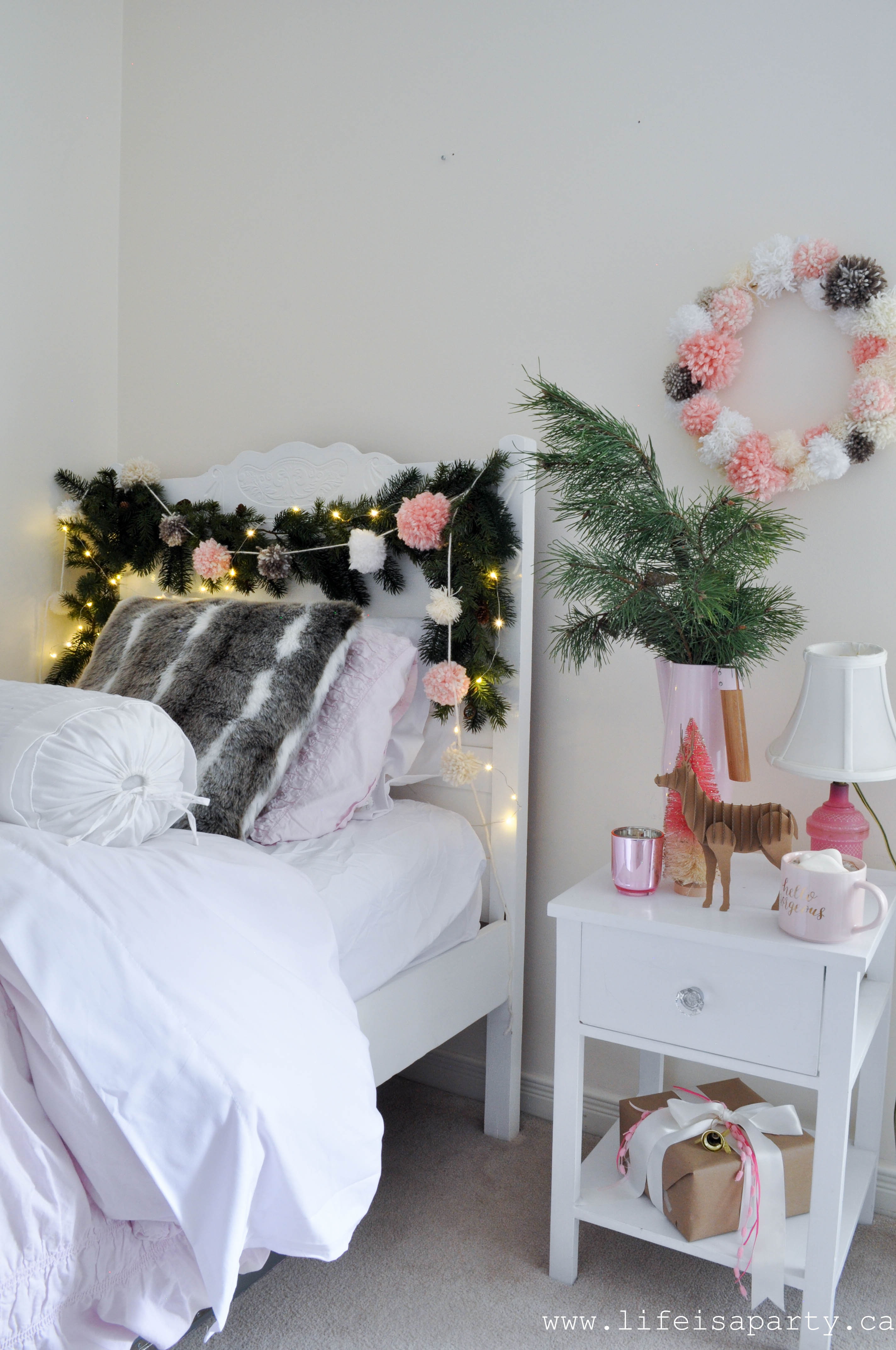 Little Girl's Christmas Bedroom -Add some coziness with warm throws, pom pom garland, and twinkle lights for any little girl's delight!