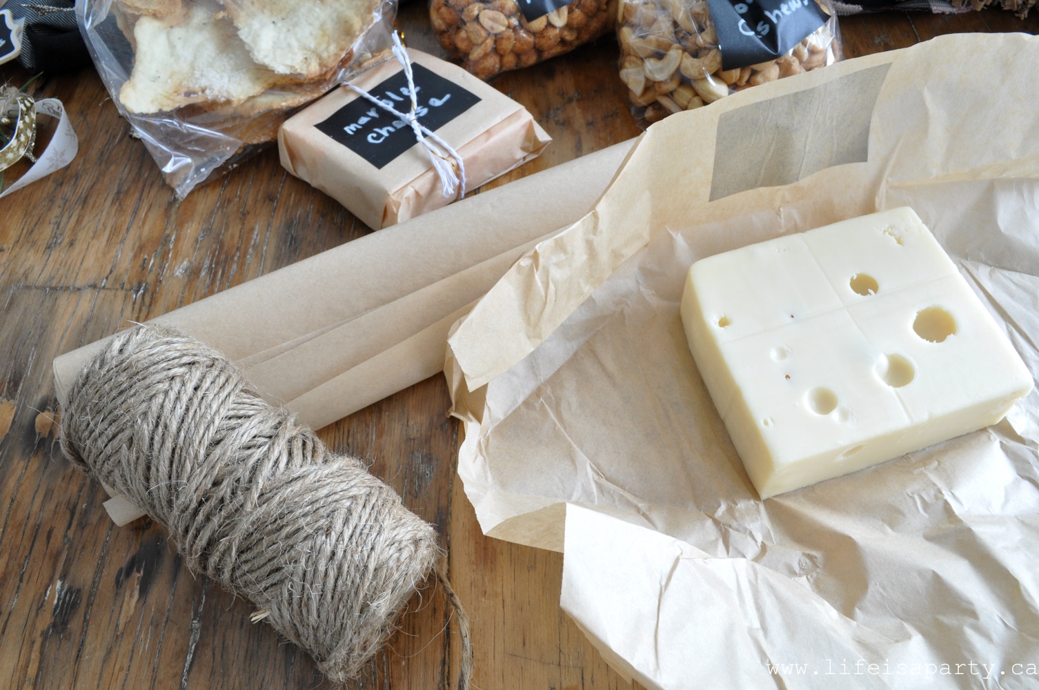 cheese wrapped in parchment paper for a wine gift basket
