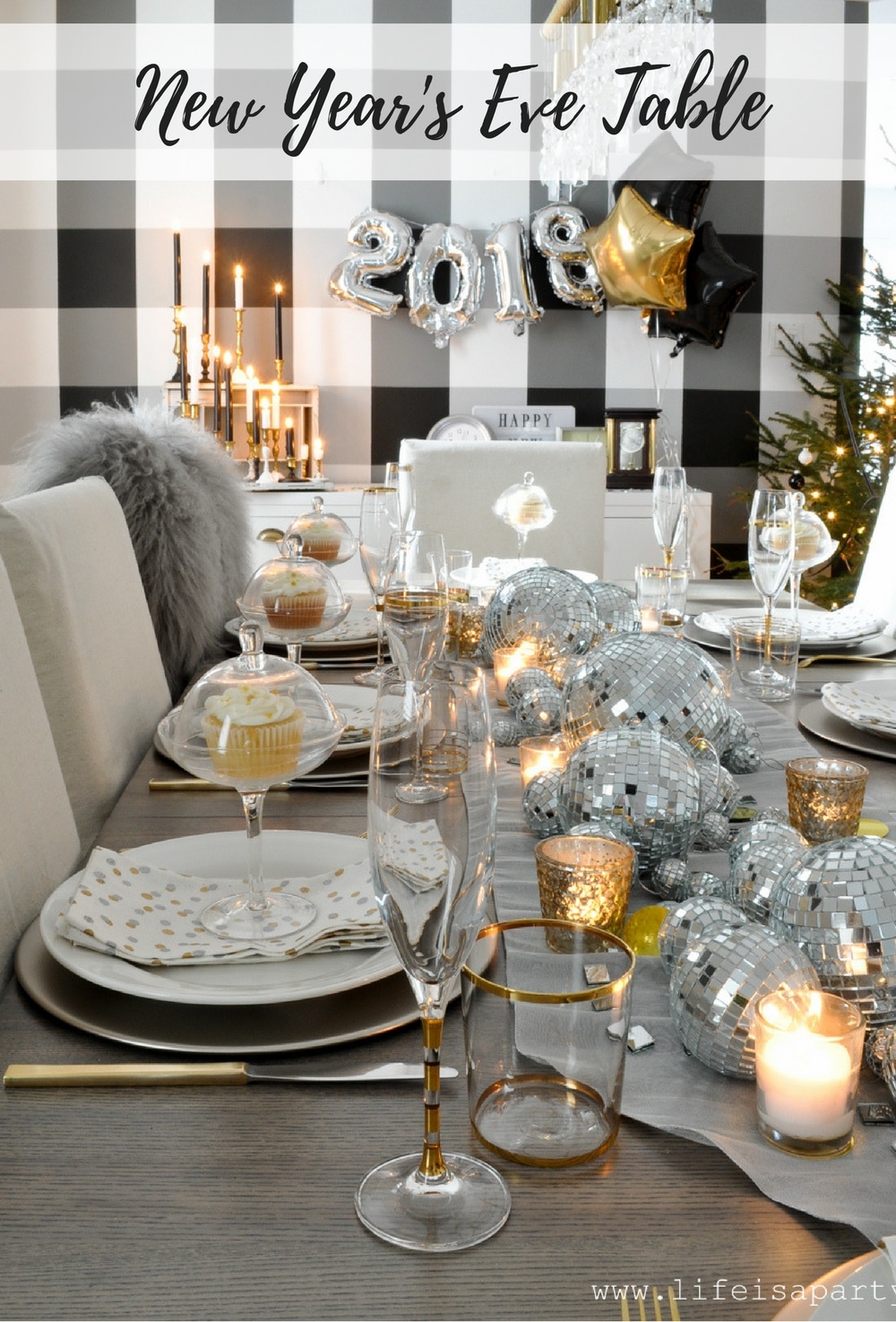 New Year's Eve Table Decorations: Be inspired by a disco ball center piece, candles, and a collection of clocks. This elegant table is full of wow factor!