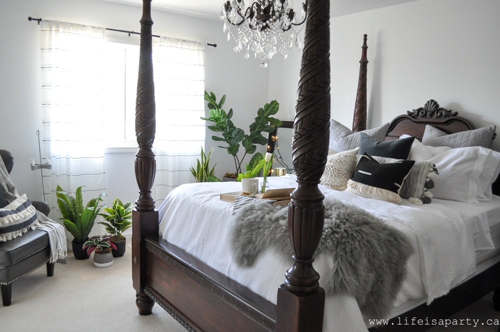 Modern Bobo Master Bedroom: Black and white, lots of texture, and a mix of modern and traditional help give this room a European Modern Boho feel.