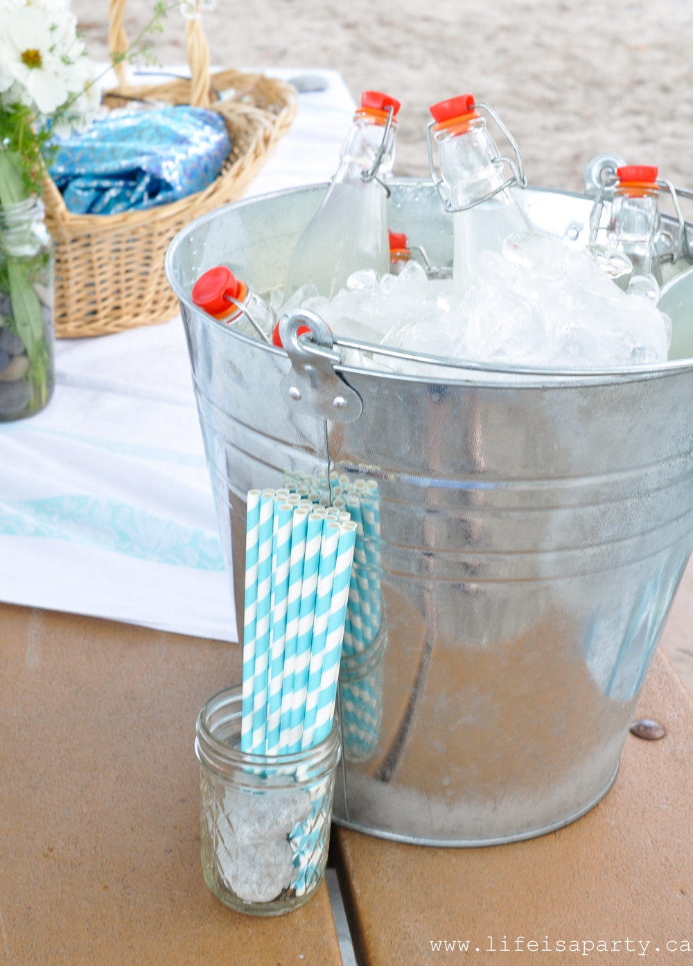 bucket of cold drinks for a mermaid party