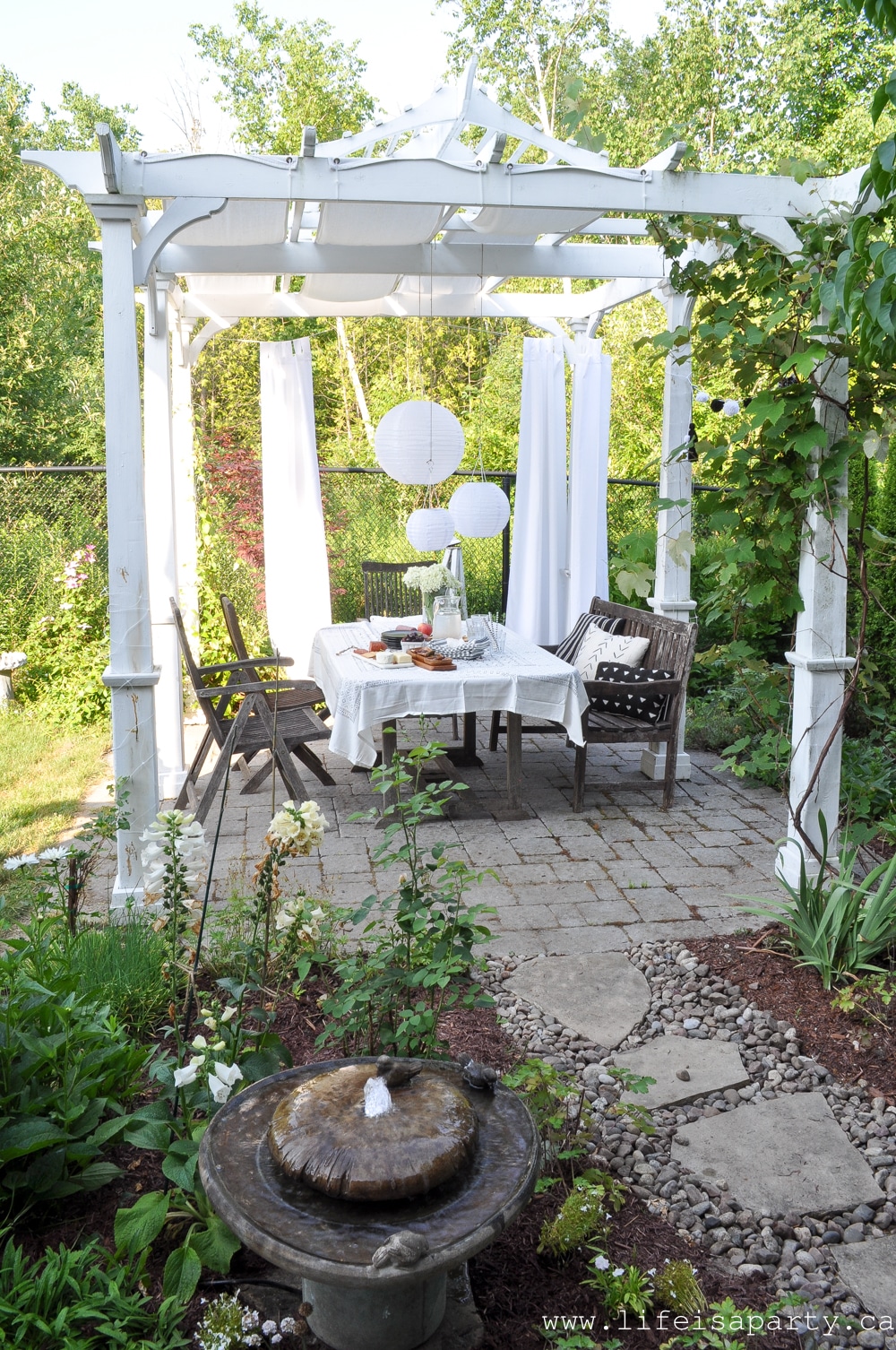 Black and White Garden pergola and dining area