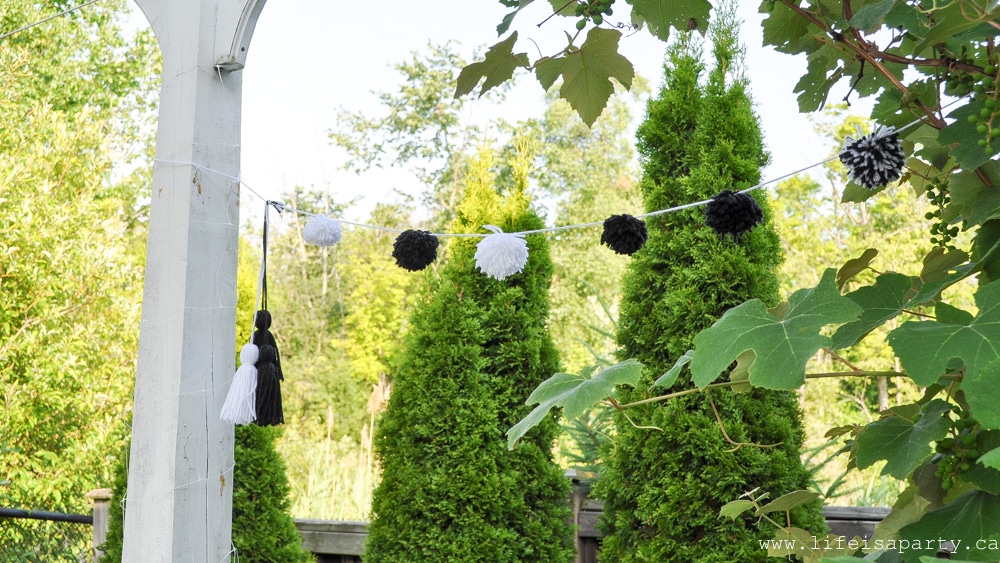 Black and White pom pops and tassel bunting for the garden