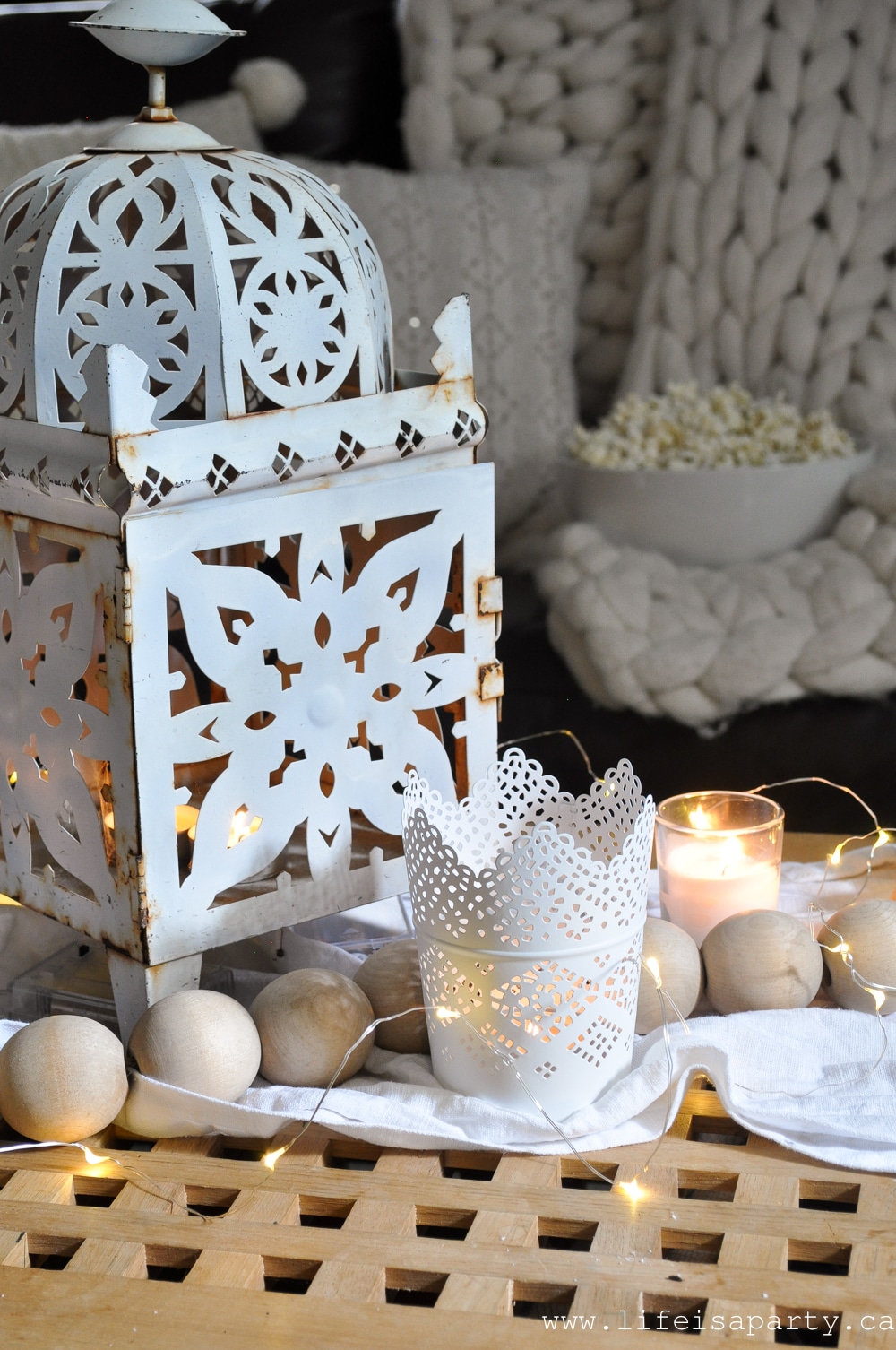 white lantern and twinkle lights