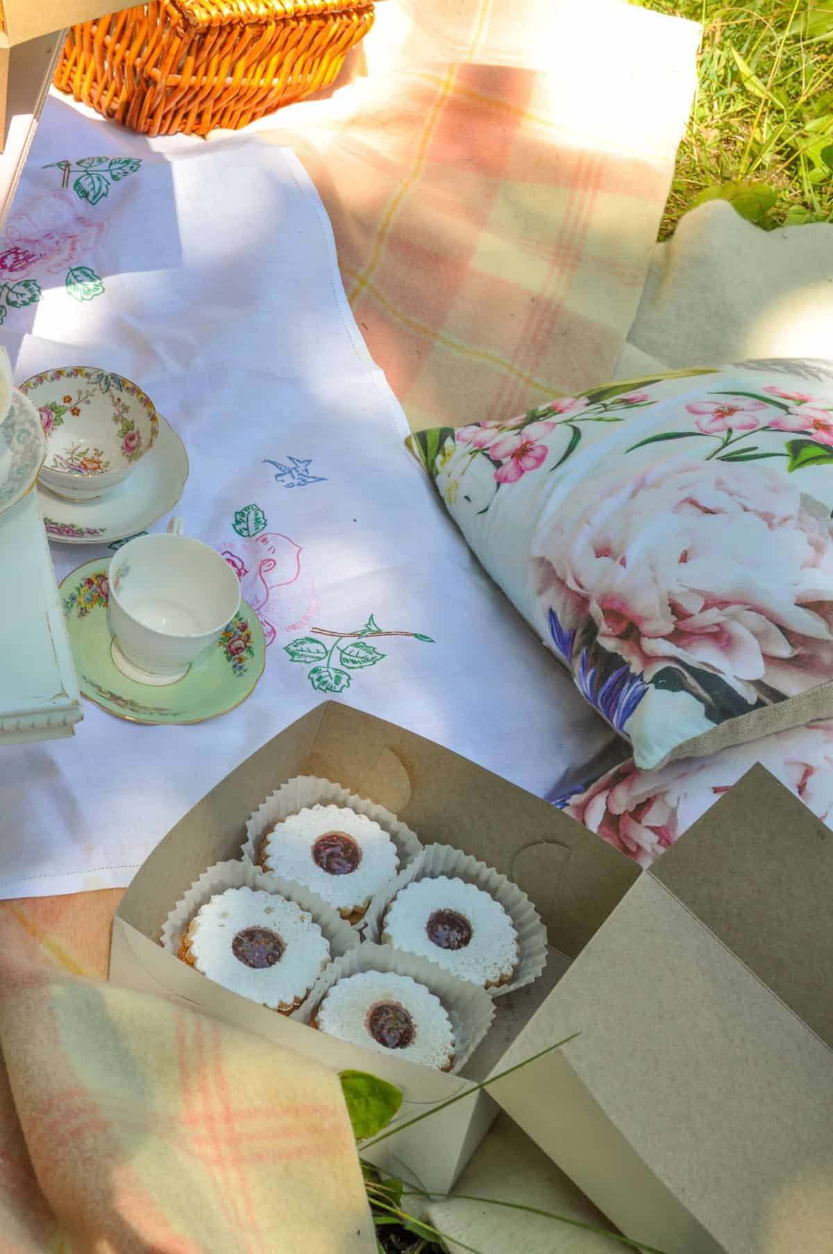 Empire cookies dusted with powdered sugar for a tea party picnic.